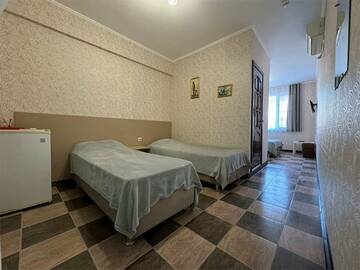 Четырехместный номер «Комфорт» в Гостинице Гармония