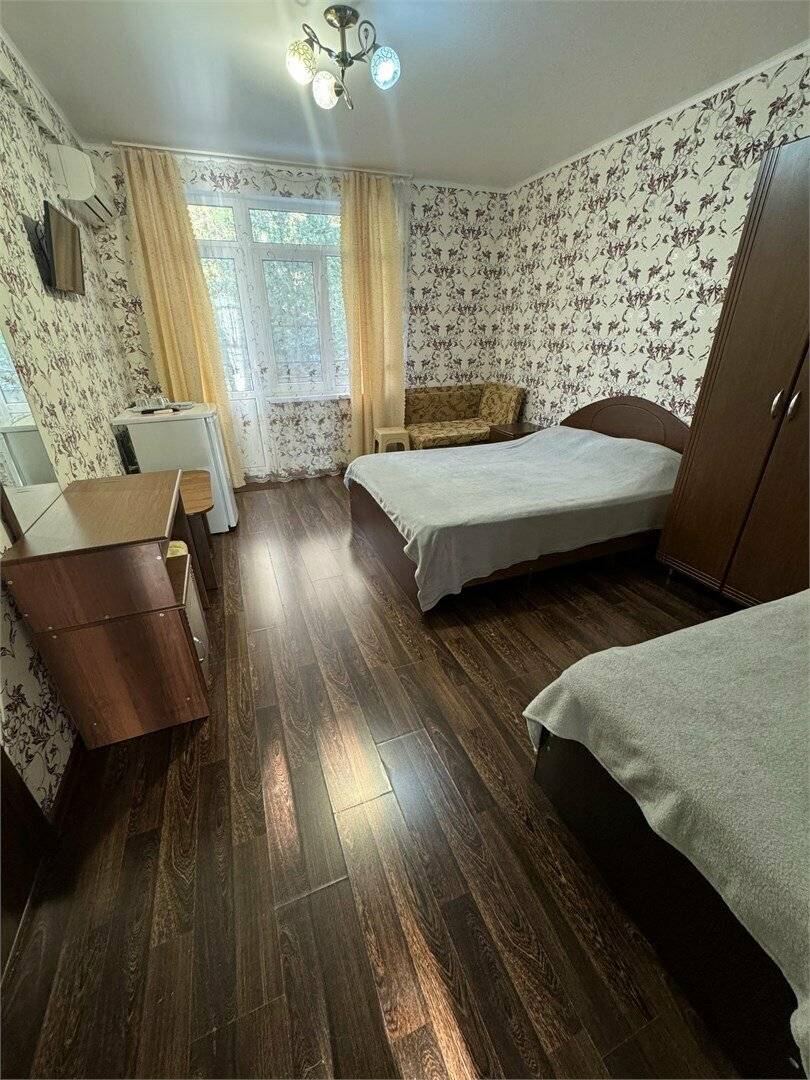 Фотографии номера Четырехместный номер стандарт в Гостинице Гармония Лазаревское