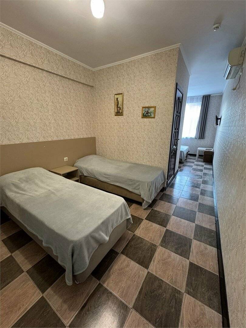 Фотографии номера Четырехместный номер «Комфорт» в Гостинице Гармония Лазаревское