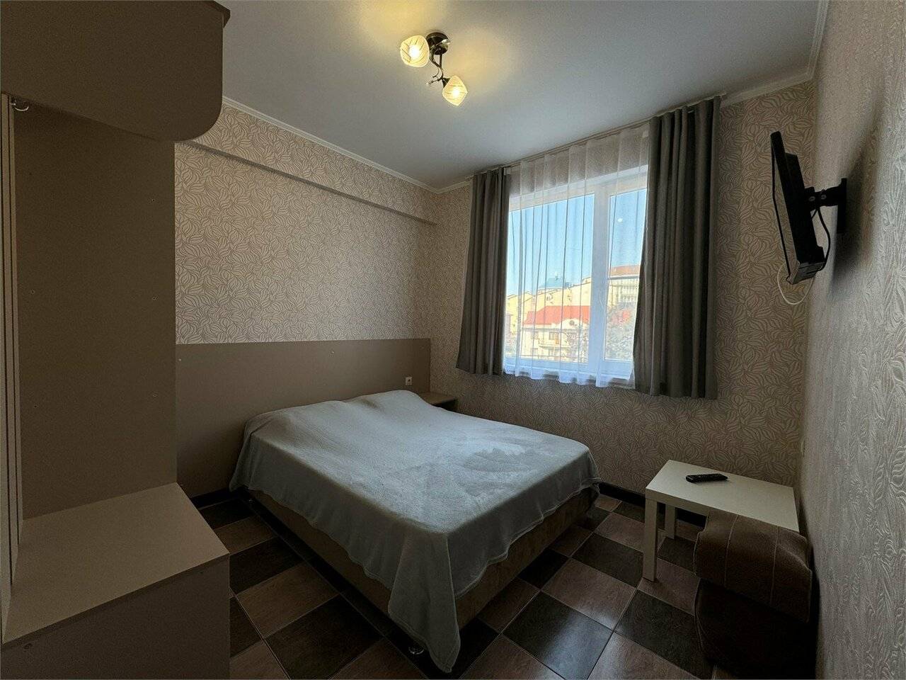 Фотографии номера Четырехместный номер «Комфорт» в Гостинице Гармония Лазаревское