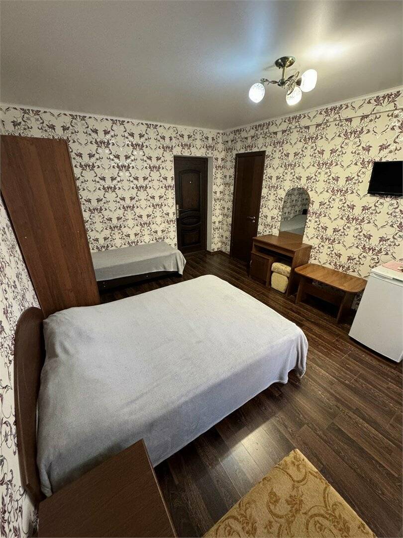 Фотографии номера Четырехместный номер стандарт в Гостинице Гармония Лазаревское