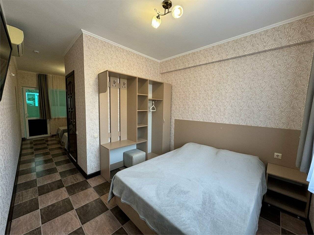 Фотографии номера Четырехместный номер «Комфорт» в Гостинице Гармония Лазаревское